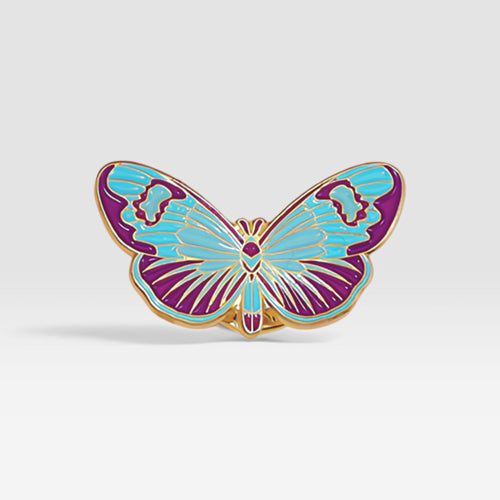 Colorful butterfly enamel pin featuring blue and purple patterned wings