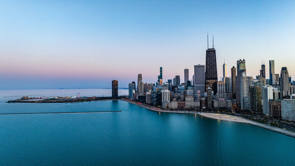 Chicago skyline with skyscrapers and Lake Michigan at sunset