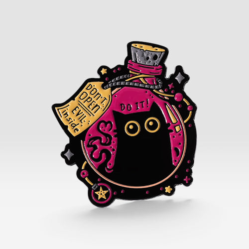 Pink potion bottle enamel pin featuring a black cat, yellow accents, and decorative gothic details