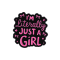 A pin that states 'I'M Literally JUST A GIRL' in pink lettering with a black border on a white background