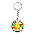 A round acrylic keychain featuring a smiling yellow sun with colorful rays and the words 'RADIATE POSITIVITY' on a white background