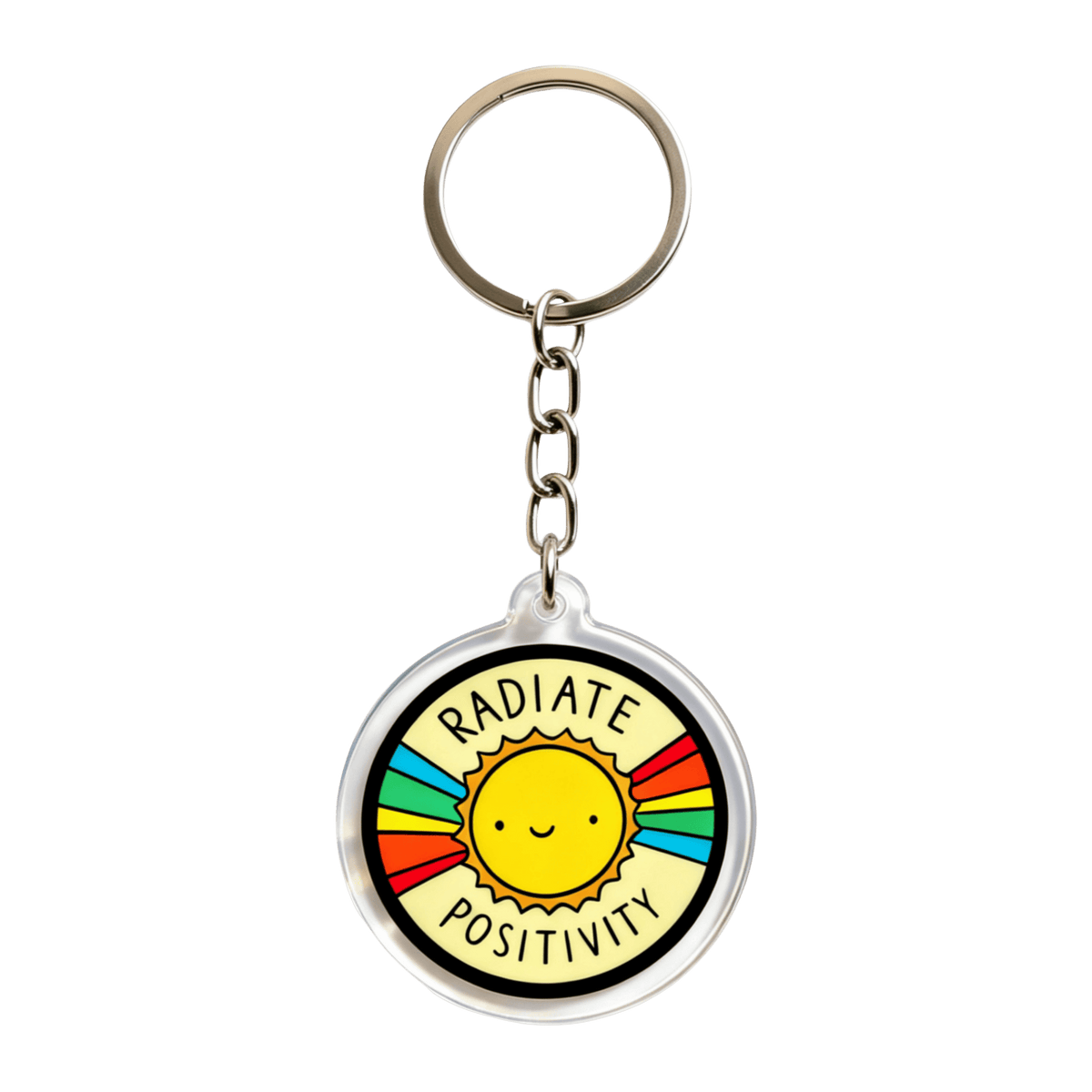 A round acrylic keychain featuring a smiling yellow sun with colorful rays and the words 'RADIATE POSITIVITY' on a white background