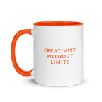 White mug with orange handle and text 'Creativity Without Limits' on a white background