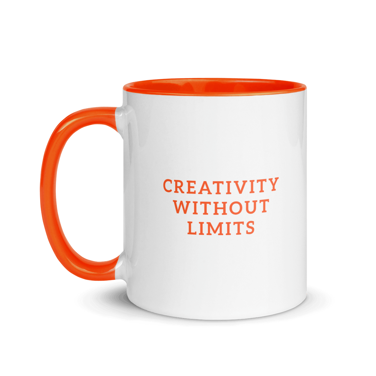 White mug with orange handle and text 'Creativity Without Limits' on a white background