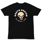 A black short-sleeve t-shirt with a graphic on the back featuring a beige skull with orange eyes, surrounded by the text 'OKETO DESIGN' and 'ILLINOIS, USA' in white