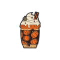 A pumpkin spice latte pin featuring orange pumpkins inside a brown cup, topped with white whipped cream, shown on a solid white background