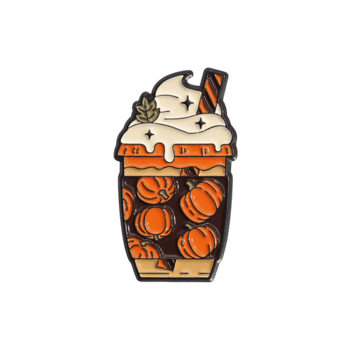 A pumpkin spice latte pin featuring orange pumpkins inside a brown cup, topped with white whipped cream, shown on a solid white background
