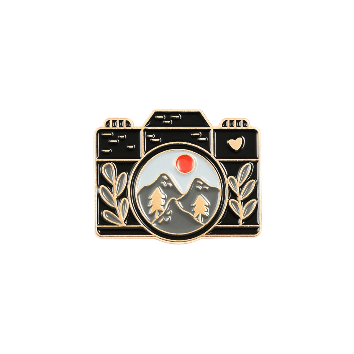 A camera-shaped enamel pin featuring a black body with gold-tone outlines and naturalistic features set against a solid white background