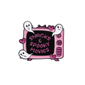 A cartoon enamel pin design of a retro pink television with ghosts and hearts around it on a dark center panel, shown on a white background