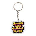 A cute acrylic keychain with text 'Sounds Like Bullshit To Me' in retro yellow font on a black background with a split ring clip and chain
