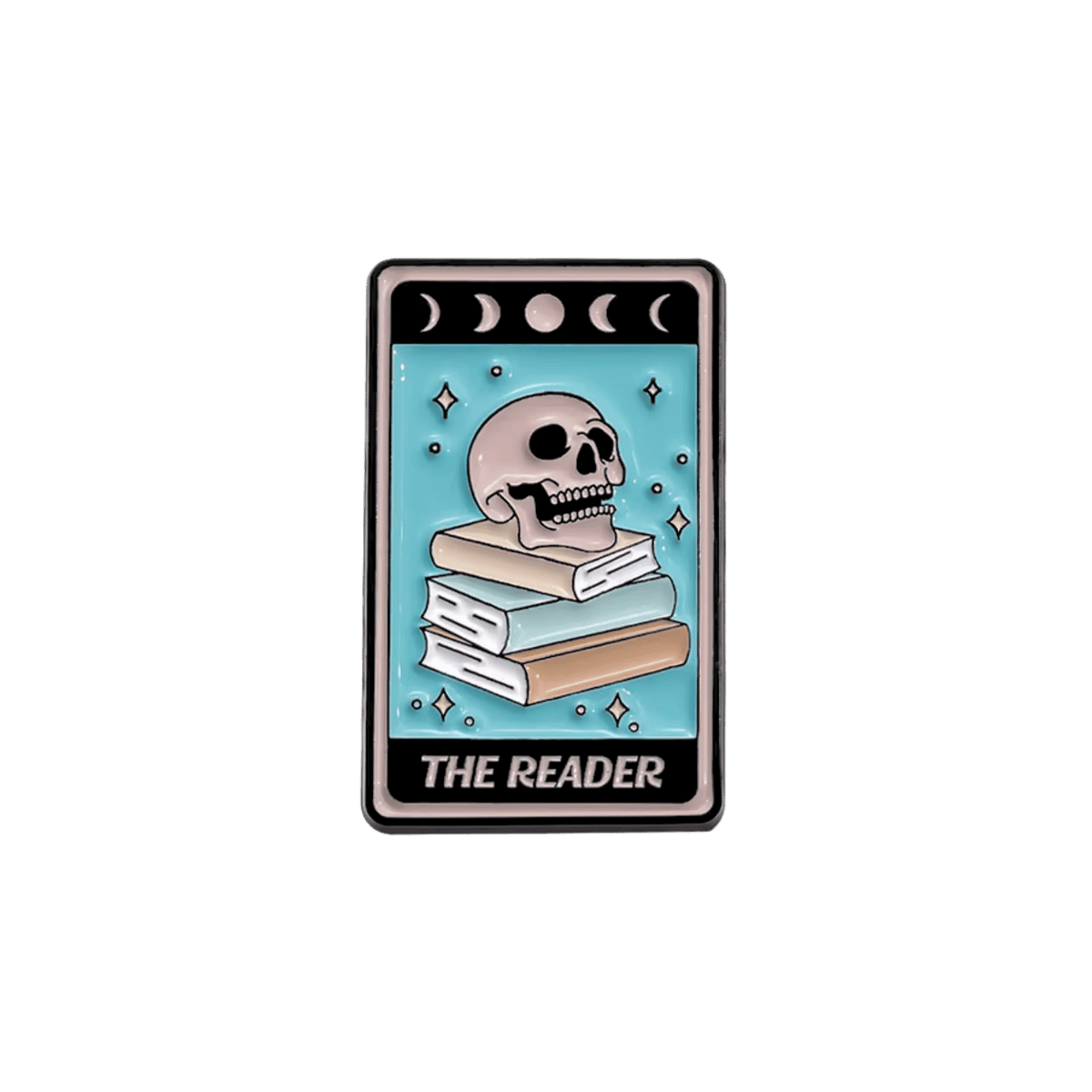 A tarot enamel pin featuring a skull resting on a stack of books against a light blue background and the text 'THE READER' at the bottom