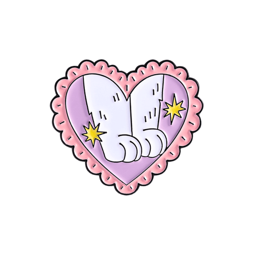 A heart shaped pin with a pink border featuring paws of a white cat and yellow stars on a white background